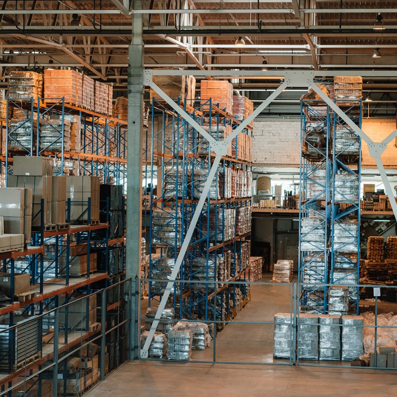 modern warehouse interior with boxes and containers on shelves